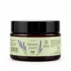Bálsamo ¡Auch! de Essential Therapeutics de 30 g en frasco de vidrio ámbar con etiqueta verde claro y lavanda.
