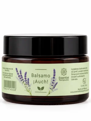 Bálsamo ¡Auch! de Essential Therapeutics de 30 g en frasco de vidrio ámbar con etiqueta verde claro y lavanda.