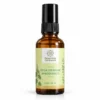 Brisa Perfume Afrodisiaco de Essential Therapeutics de 50 ml en frasco ámbar con atomizador negro y etiqueta botánica verde.